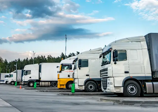 FLC Freight trucks lined up for loading at Dubai warehouse
